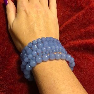 Multiple periwinkle bracelets